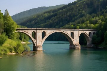 Fototapeta premium Scenic landscape of a bridge over a river, forest and hill views