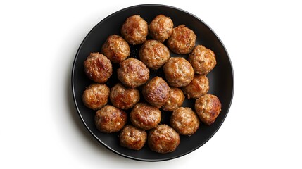 Delicious baked meatballs on black plate - perfect for appetizers or main course