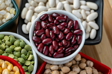 several pots with raw grains for preparing healthy food