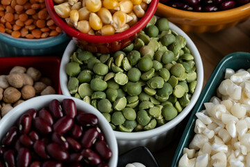 several pots with raw grains for preparing healthy food