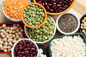several pots with raw grains for preparing healthy food