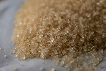 Close-up of brown sugar on a pile.
