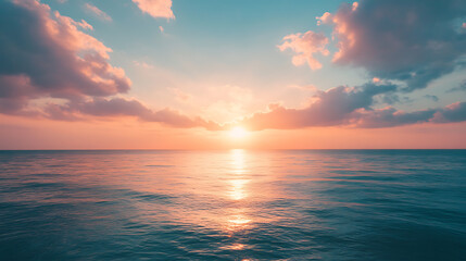 Fototapeta premium Serene ocean sunset with colorful sky and calm waves 