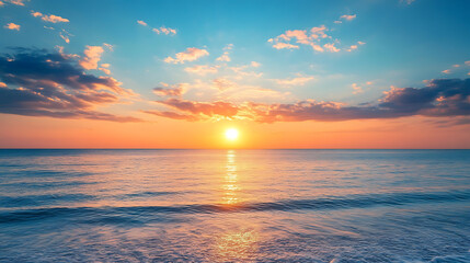Fototapeta premium Serene ocean sunset with colorful sky and calm waves 