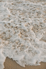 Beach, Sand, Waves. Waves breaking on the beachfront and forming incredible textures