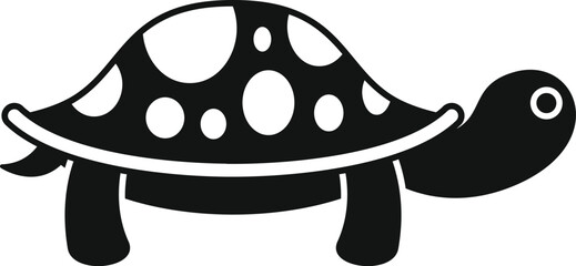 Simple black and white spotted turtle walking to the right of the frame