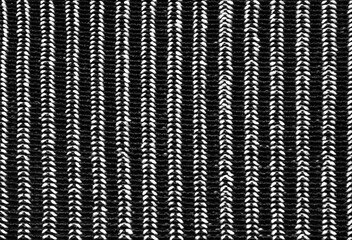 Black braid pattern knit fabric texture close up as background