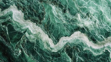 Obraz premium Close-up of textured green marble surface, with swirling white veins, perfect for luxury or natural-themed designs.