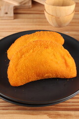 delicious fried and baked pastries, soft and crunchy on the plate or in your hand.