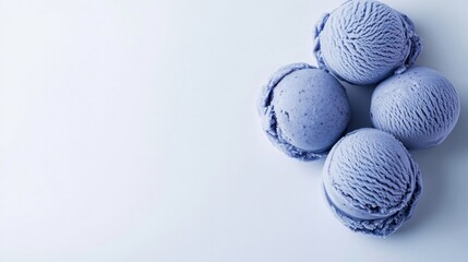 Four scoops of lavender ice cream arranged in a circle on a white background, with space for text.