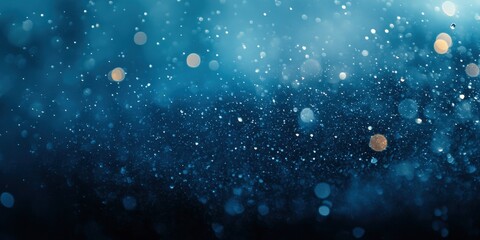 Obraz premium Mysterious Sparkling Lights Underwater Captured in Blue Hues with Glowing Particles