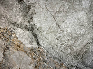 Natural dark grey emperador marble texture with black and golden veinings. Grey and gold natural...