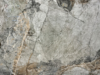 Natural dark grey emperador marble texture with black and golden veinings. Grey and gold natural marble stone, Seamless background texture.