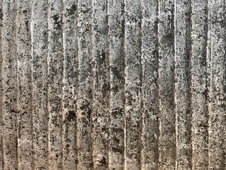 Obraz premium Cemented texture with stripes vertical line pattern on natural stone pottery. Seamless background texture