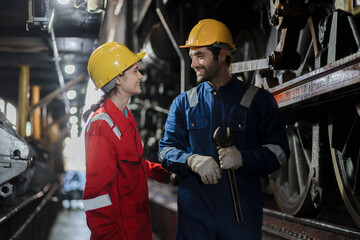 Engineer checking construction process railway and checking work on railroad station . Railway...