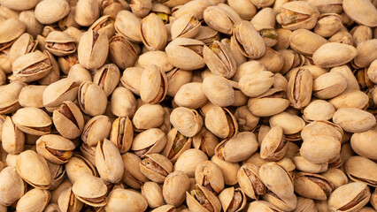 Tasty pistachios isolated on a white background.