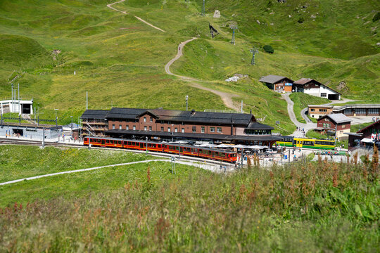 Kleine Scheidegg, Switzerland - July 25, 2025: Train station - Swiss train travels from the Lauterbrunnen to Kleine Scheidegg in the Swiss Alps in summer