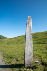 Trail marker for the Jungfrau-Eiger Walk trail Switzerland