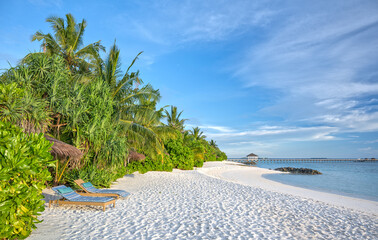 sunbeds on a tropical maldivian beach
