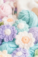 crochet floral pattern project with pastel colored yarns showing individual flowers and a partially completed blanket