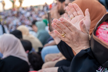Female hands cheering and clapping on stadium