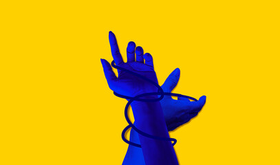 Painted blue two hands aesthetic Network connection on yellow background. Art collage digital pop modern art.