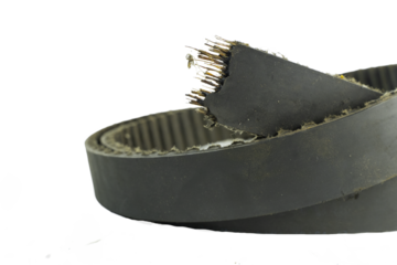 Close up Old Timing belt expire on white background.