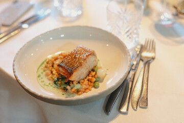 plate with delicious fish filet in gourmet restaurant on a wedding