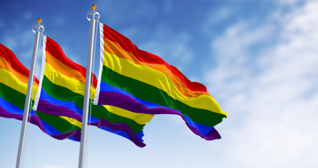 Rainbow flag waving on a clear day