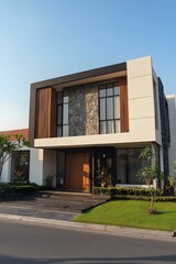 Obraz premium Modern Two Story House with Stone and Wood Exterior