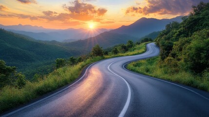 Fototapeta premium Winding Road Through Lush Mountains at Sunset