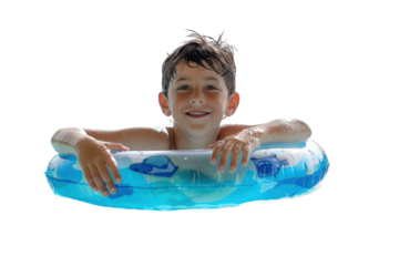 Child with inflatable tube swimming in a summer pool