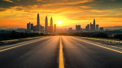 Obraz premium Sunrise over a Cityscape with a Road Leading Towards the Horizon
