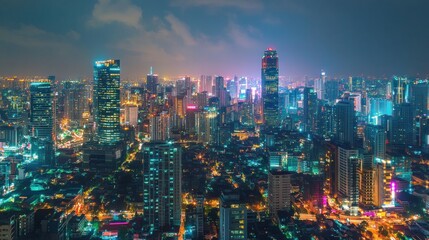 Obraz premium Nighttime Cityscape with Skyscrapers and Streetlights