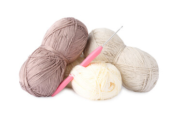 Skeins of colorful yarns and crochet hook isolated on white