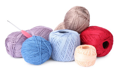 Many colorful yarns and crochet hook isolated on white