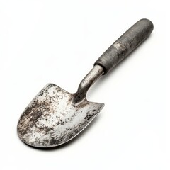 The sturdy garden trowel lays quietly displaying its timeworn handle and rusting blade