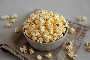 Homemade Salty Popcorn in a Bowl, side view.