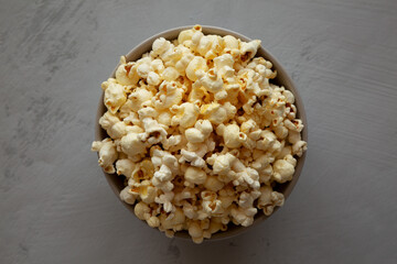 Homemade Salty Popcorn in a Bowl, top view. Flat lay, overhead, from above.