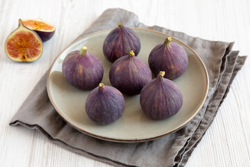 Raw Organic Figs on a Plate, side view.