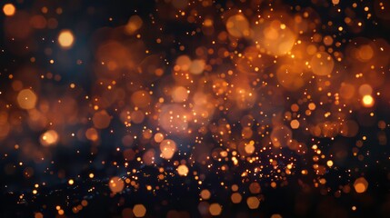 Abstract festive bokeh background with sparkling golden lights on black backdrop.