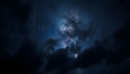 Fototapeta premium Starry night sky with a vibrant nebula cutting through the clouds.