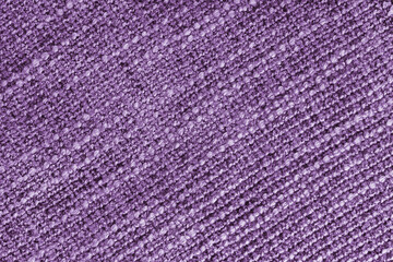 Jacquard diagonal woven coarse weave texture upholstery purple fabric background