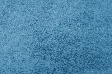 Cloth structure of jacquard blue fabric with abstract shabby texture background closeup, macro