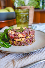 tuna tartar with avocado on a house table