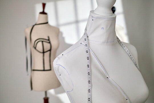 Dress Forms Media Mannequins with seamstress tailor tailoring in warehouse loft Atelier studio with window lighting