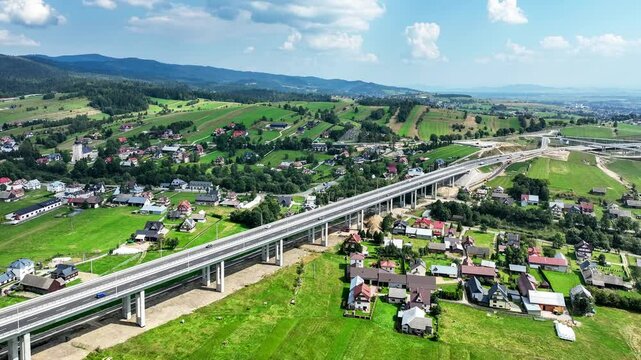 New viaduct on last fragment of Zakopianka motorway in Poland over Klikuszowa village, main place of traffic jams.  fragment of highway from Rdzawka to Nowy Targ opened for traffic in September 2024
