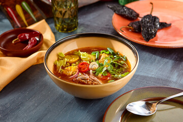 Hearty Lamb Vegetable Soup in Rustic Setting with Vibrant Colors and Natural Lighting