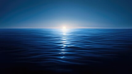 Obraz premium A serene ocean view at sunrise, showcasing calm waters and a tranquil atmosphere, perfect for relaxation and meditation.