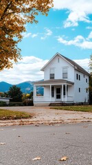 A rustic house stands in front of the Mountains, illuminated by golden hour light, with an overcast sky enhancing the serene landscape